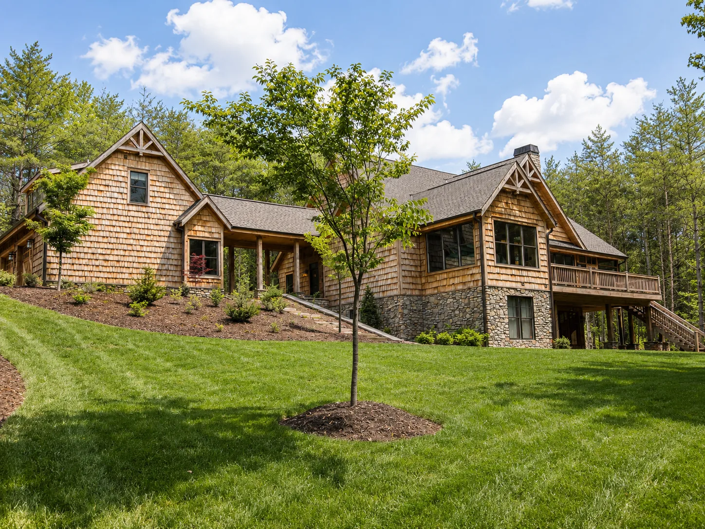 Custom luxury home rear exterior built by Higgins Building Group in Western North Carolina