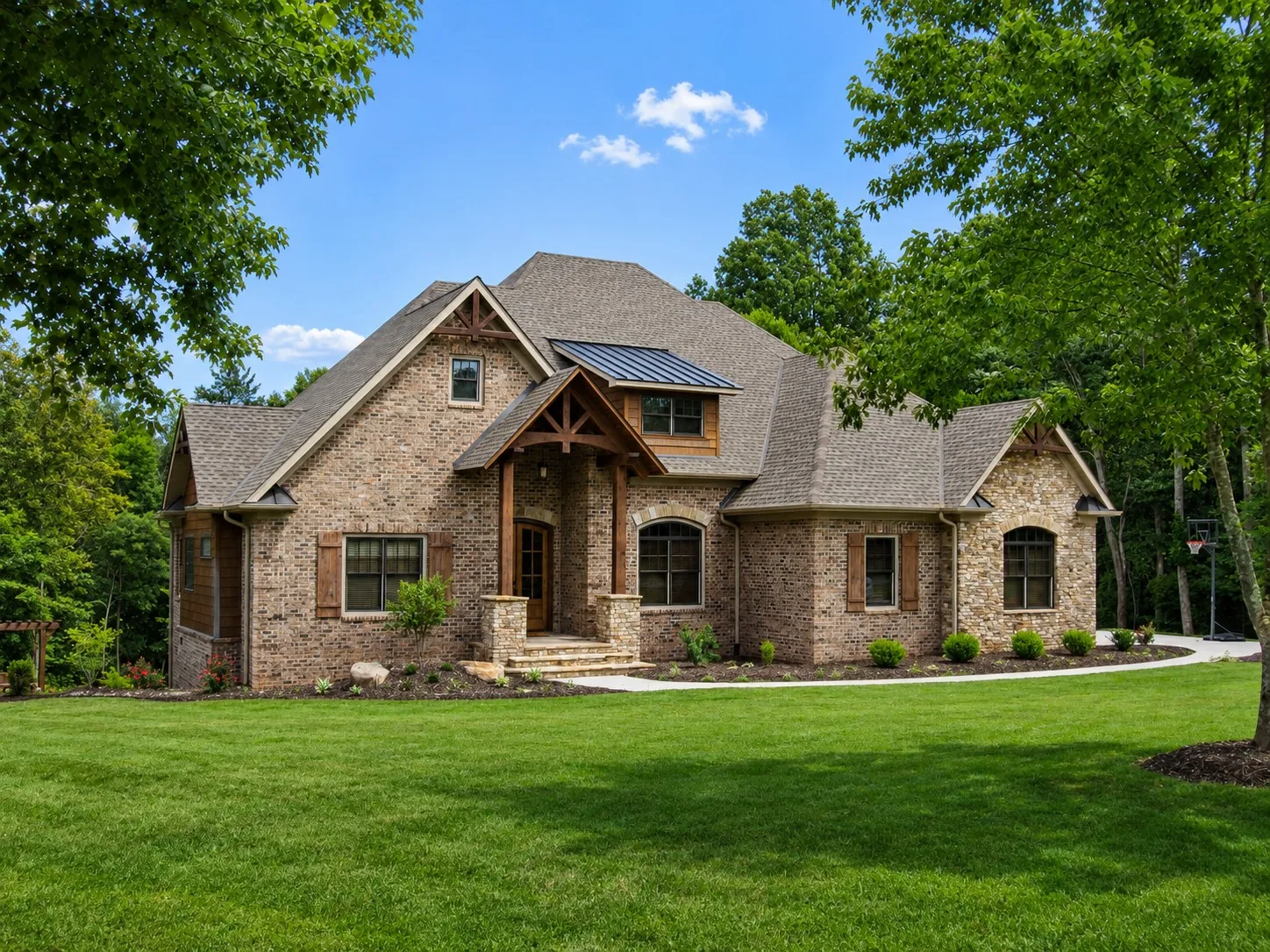 Custom luxury home exterior built by Higgins Building Group in Western North Carolina