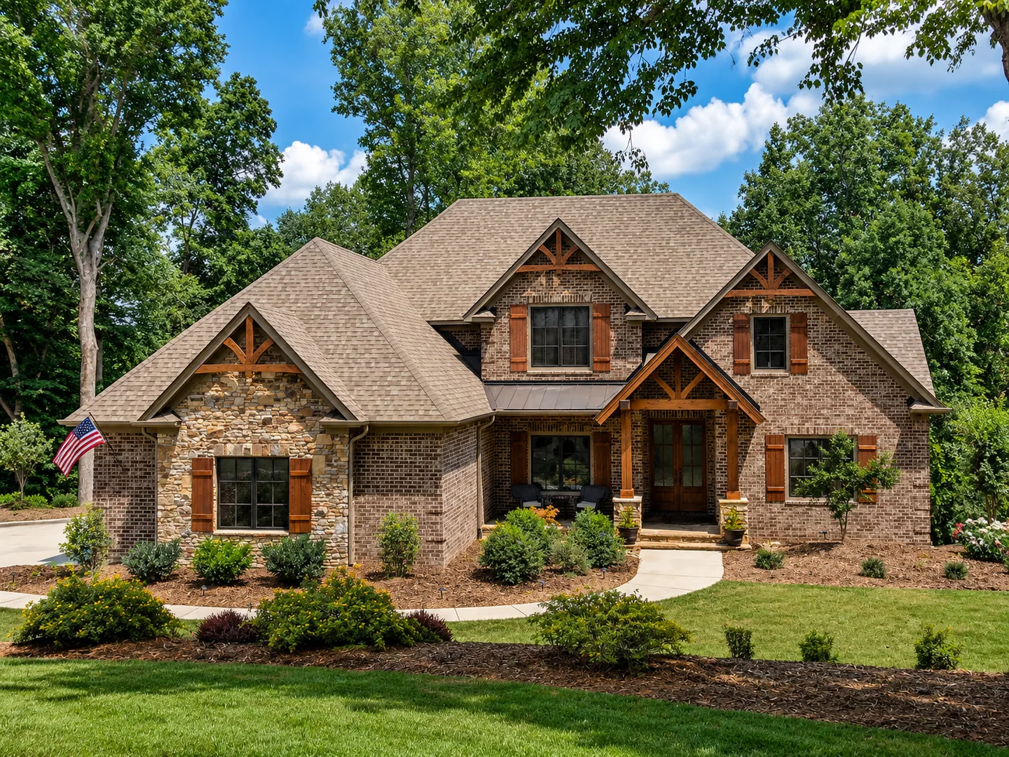 Custom luxury home exterior built by Higgins Building Group in Western North Carolina